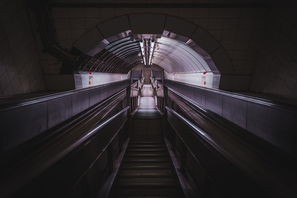 a dark staircase with lights