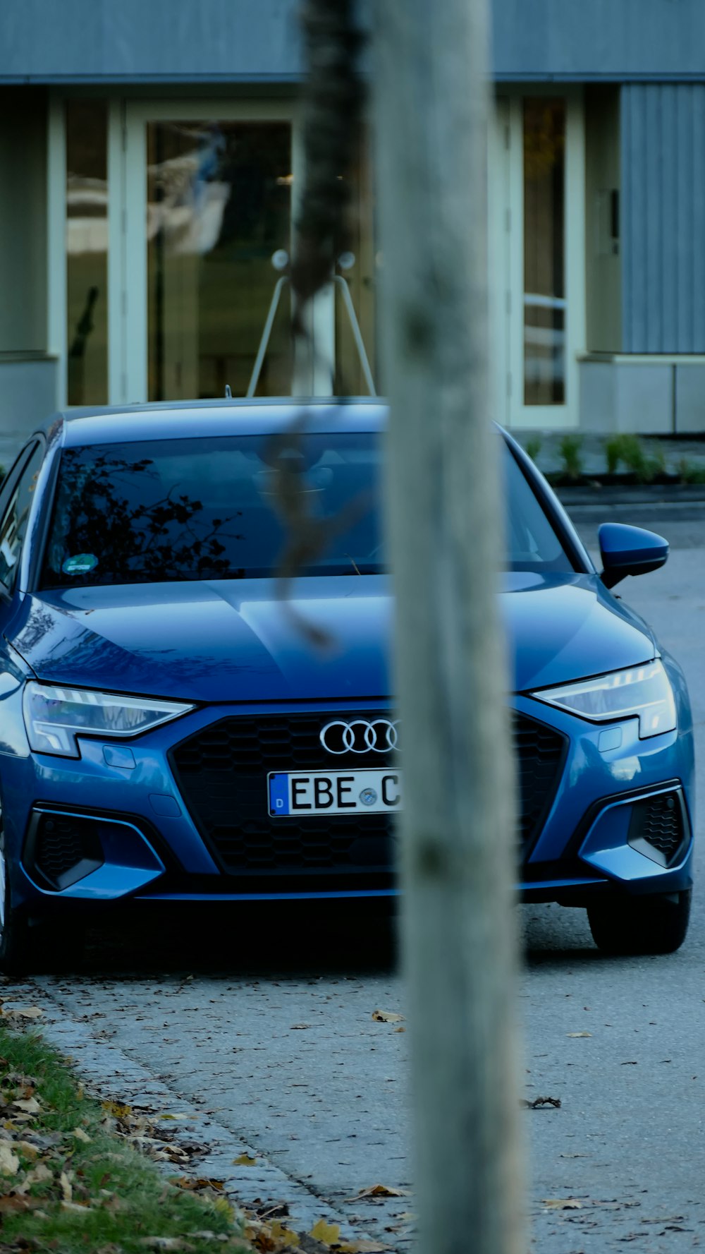 a car parked in front of a building