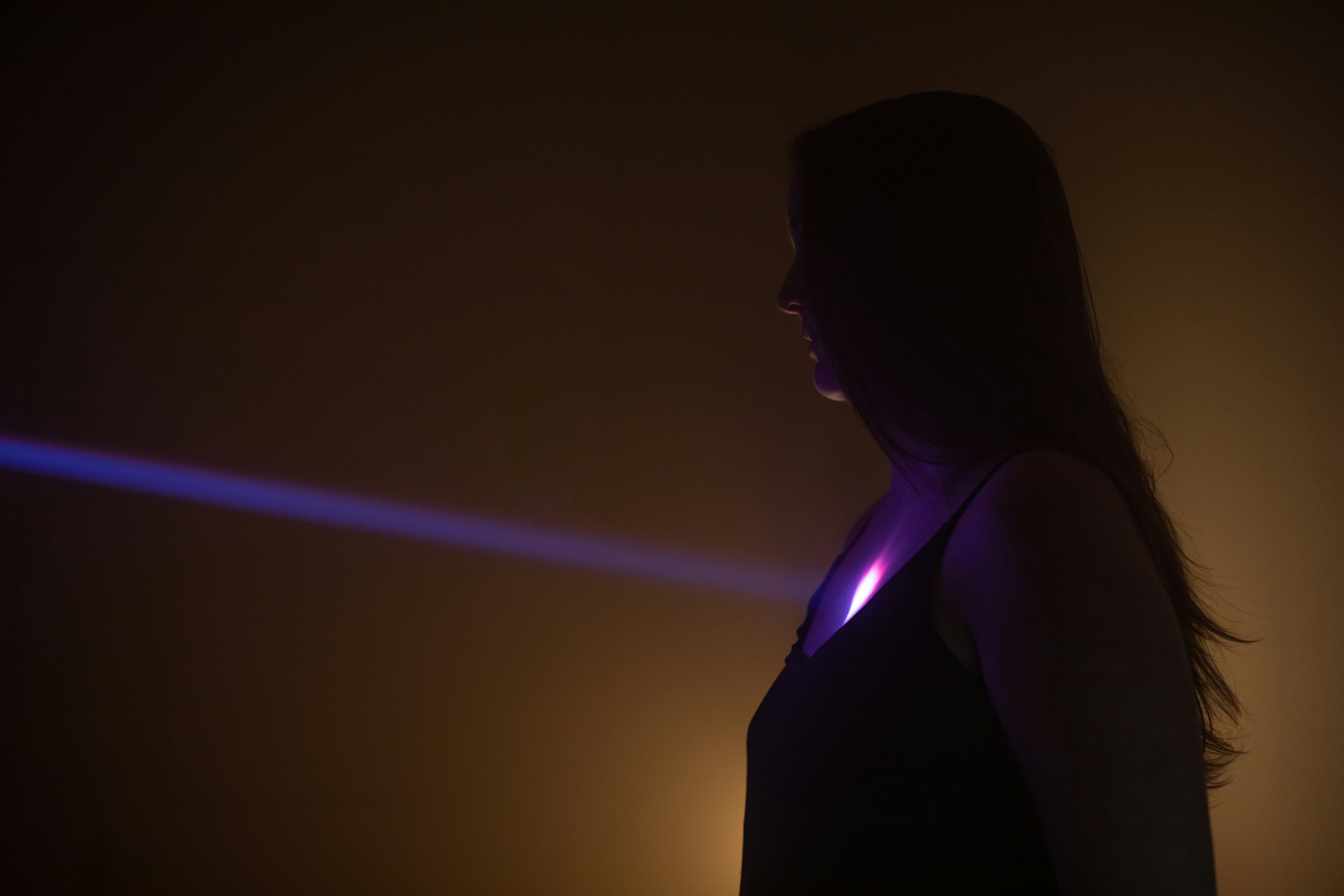Woman with purple light