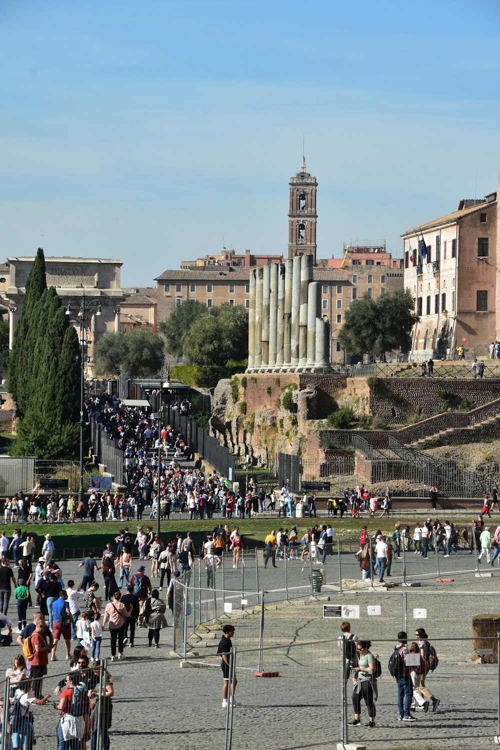 a crowd of people in a city square