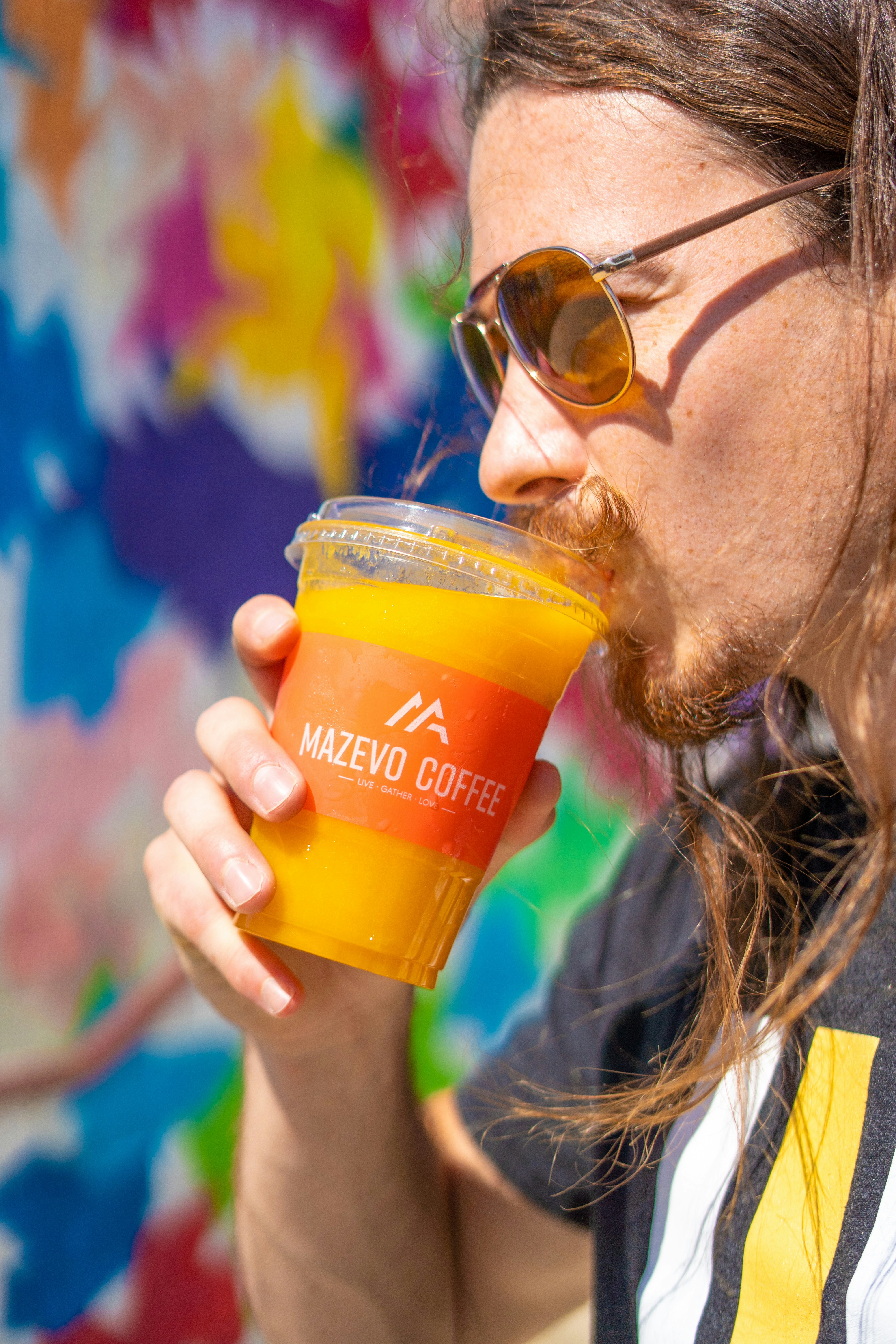 a person drinking a beer