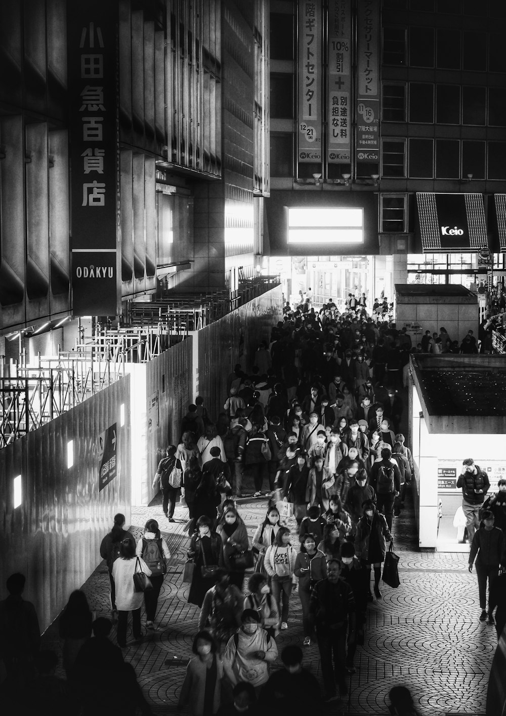 a crowd of people in a street