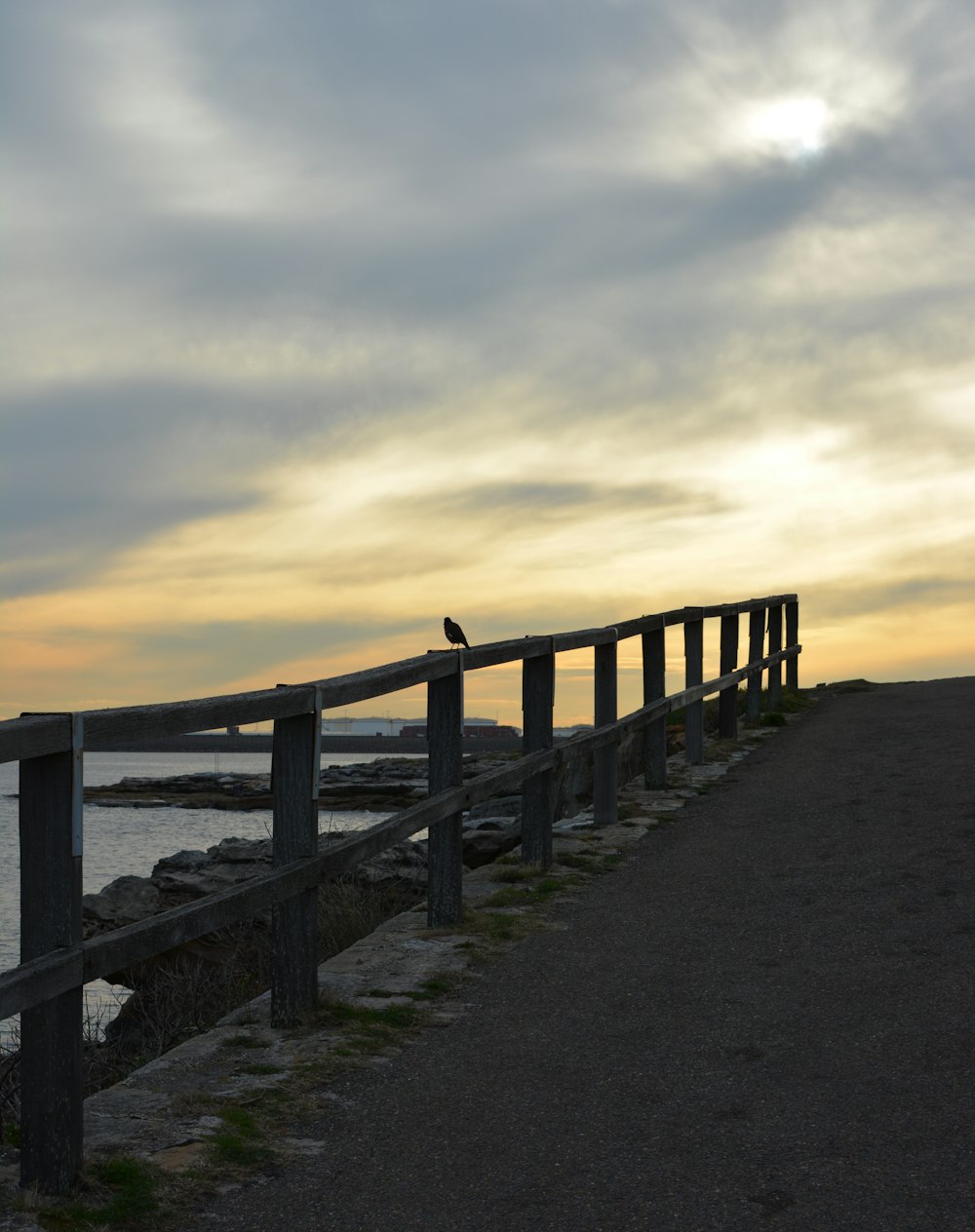 a wooden bridge over water