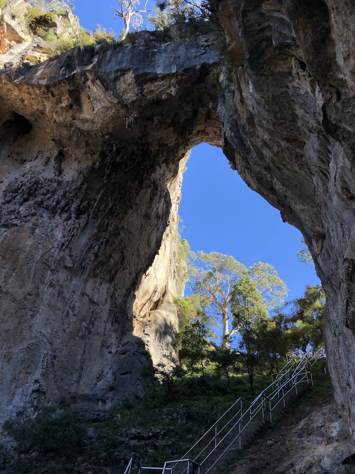 A limestone arch over a stairway at Jenolan Caves