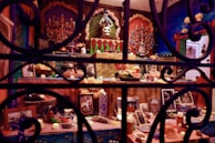 A vibrant altar decorated with flowers, stones, and symbolic objects representing ancestral wisdom.