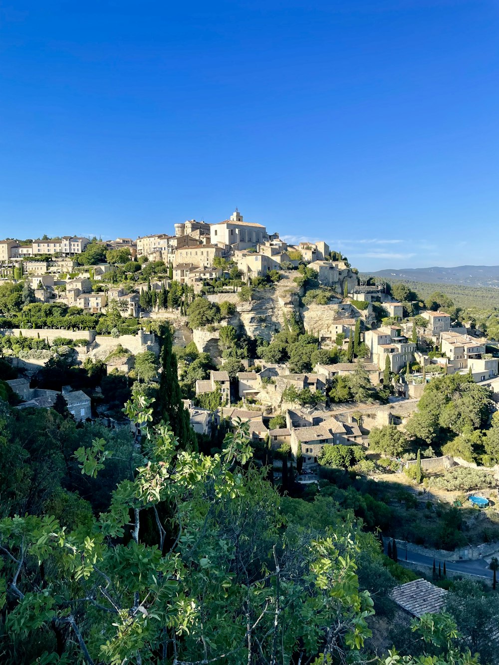 a large building on a hill