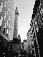 a city street with tall buildings