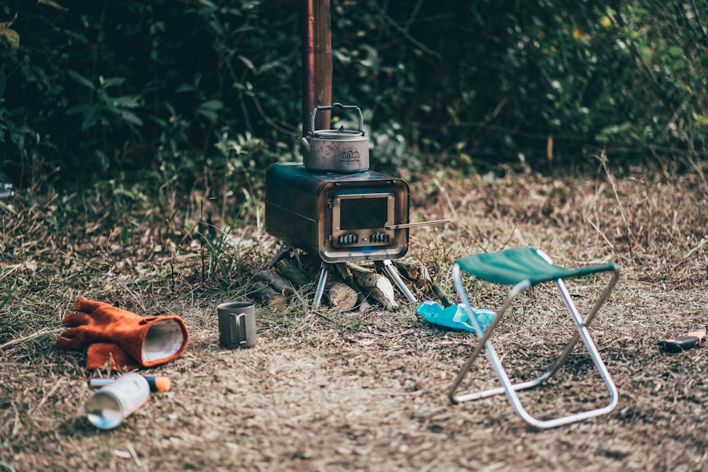 a machine outside with a hose