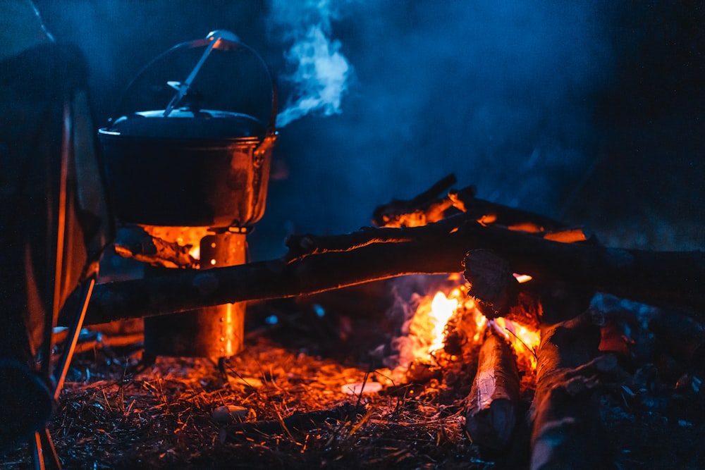 a fire burning in a pit