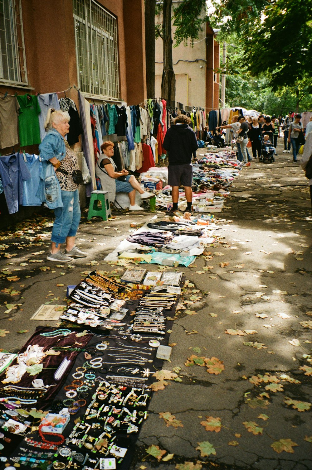 people shopping at a street market