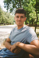 a man sitting on a bench