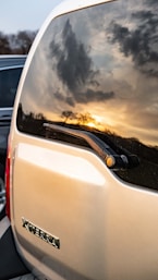 rear window reflecting the sunset