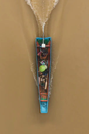 a colorful necklace on a white surface