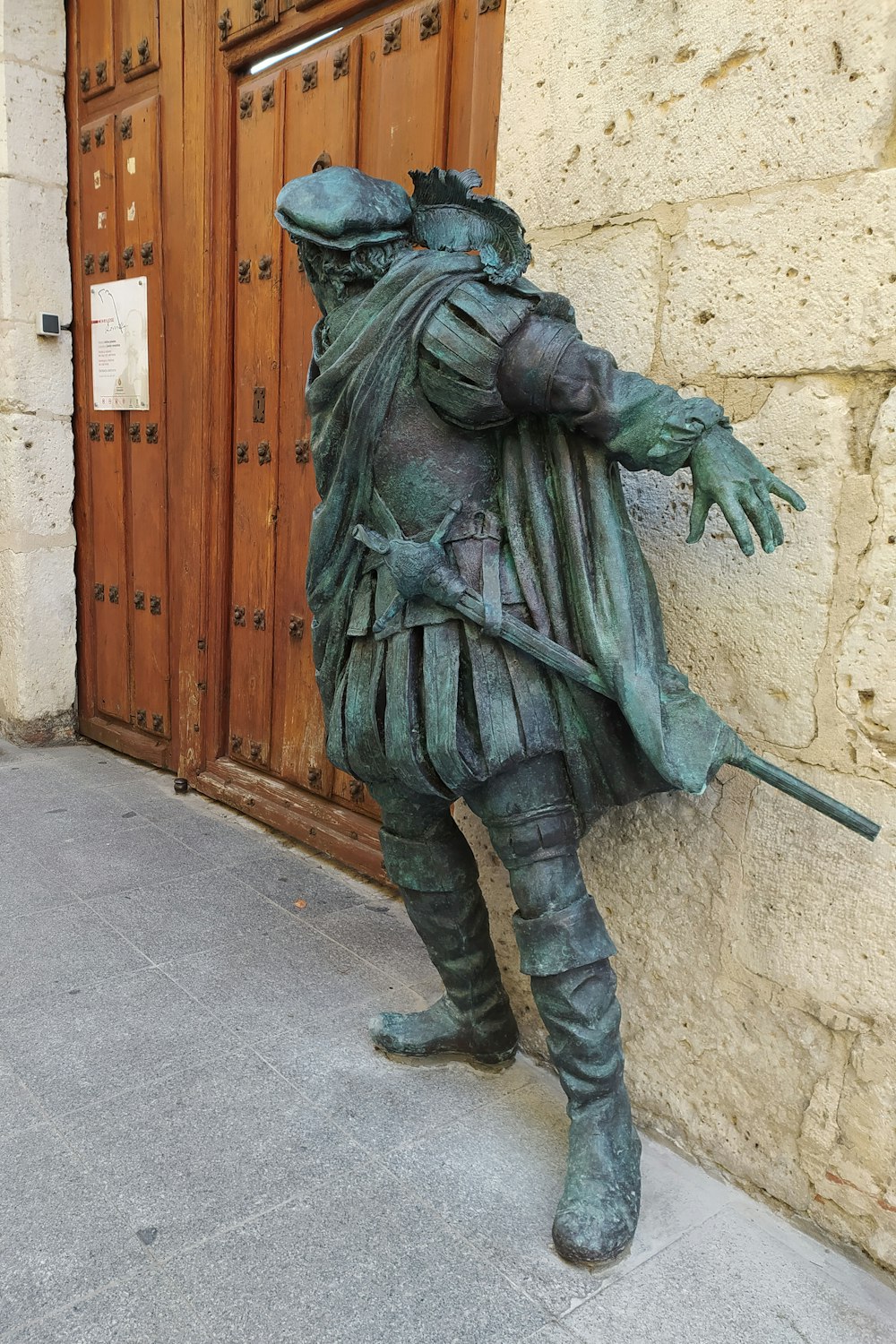 a statue of a person in armor