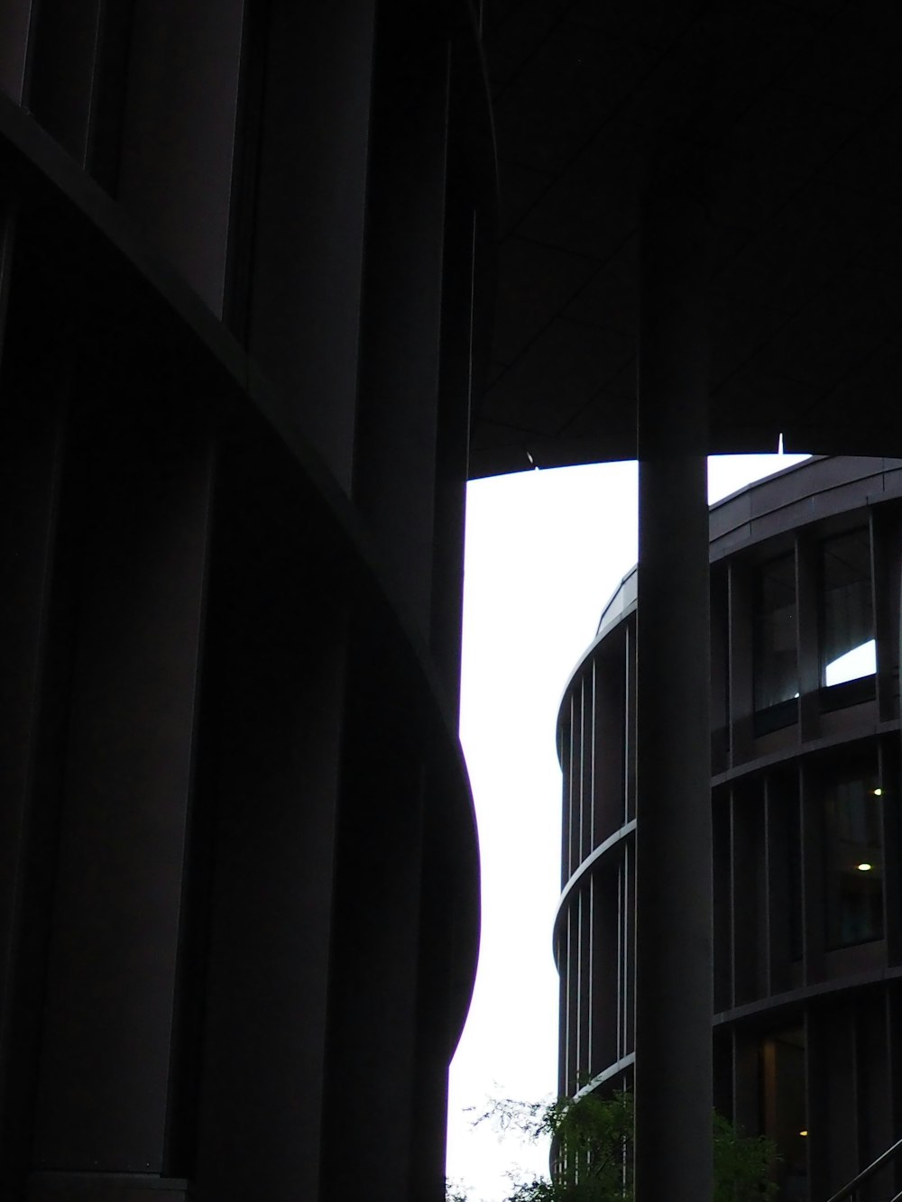 a view looking through a window at a building