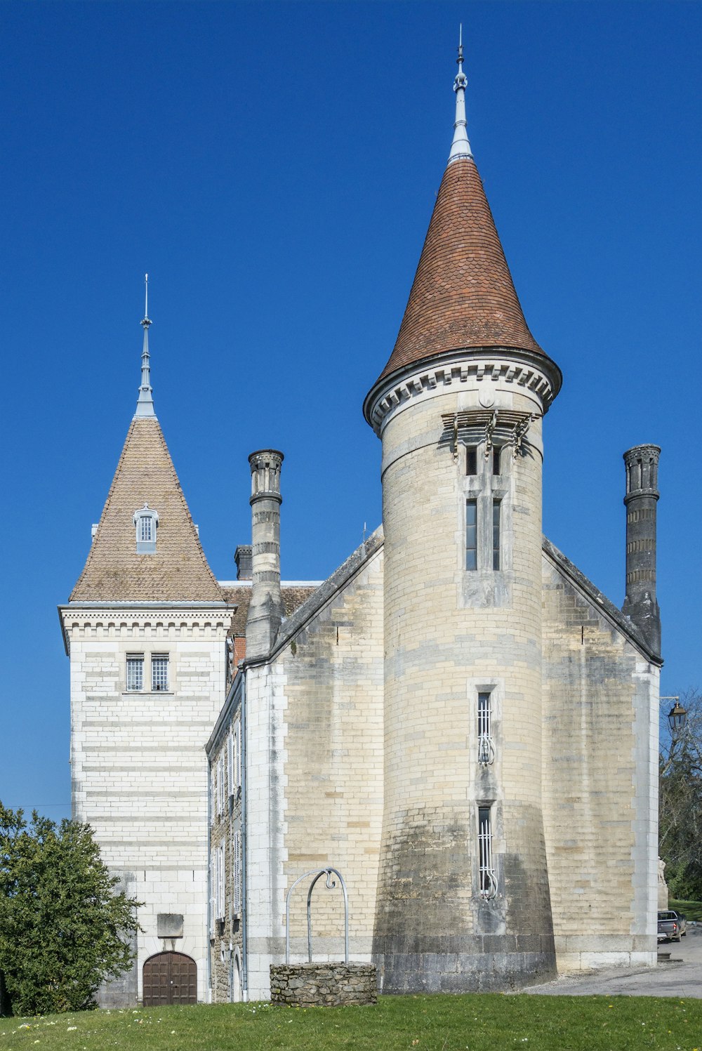 a large stone building with towers