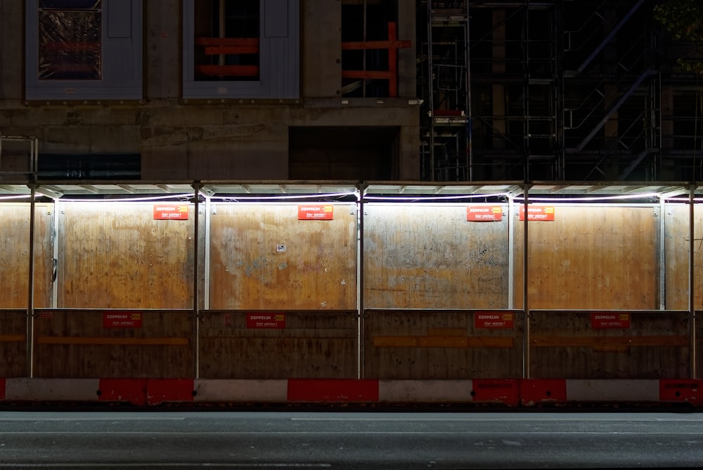 a large metal container with red and white signs on it