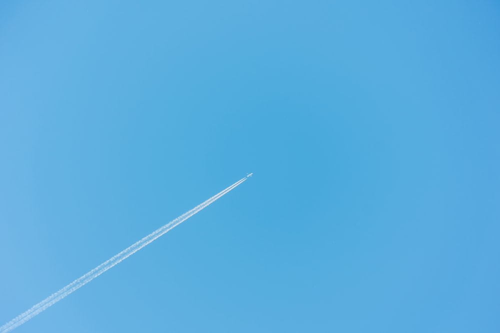 a jet leaving a trail of smoke