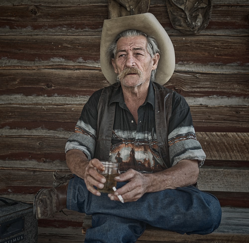 a man sitting on a bench