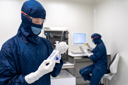 a few people in blue protective gear