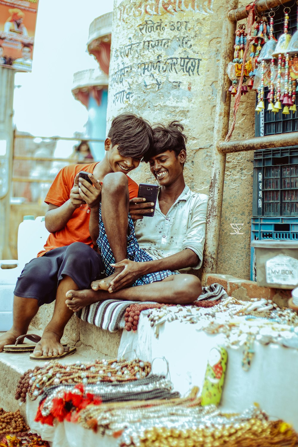 a man and a woman sitting on a bench