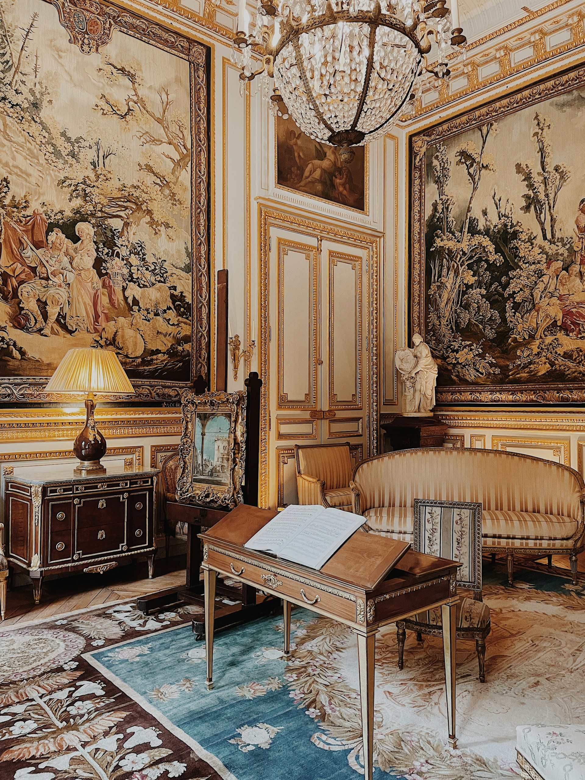 a room with a piano and a rug