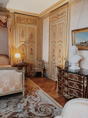 a room with a bed and a chair