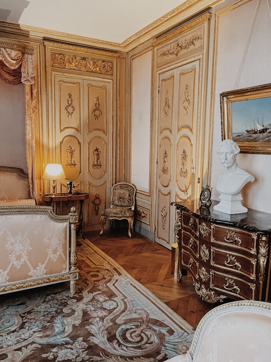 a room with a bed and a chair