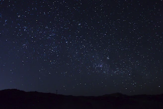 A night sky over Paraguay with stars shining brightly, symbolizing space exploration.