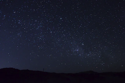 A night sky over Paraguay with stars shining brightly, symbolizing space exploration.