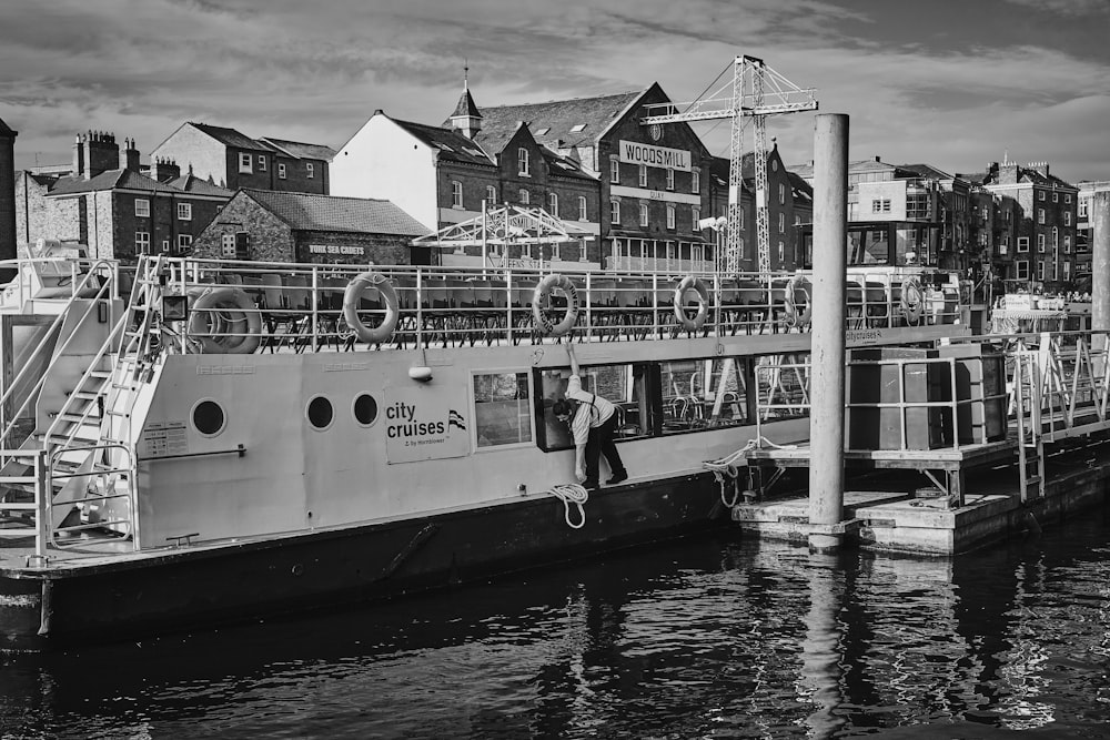 a boat is parked on the water