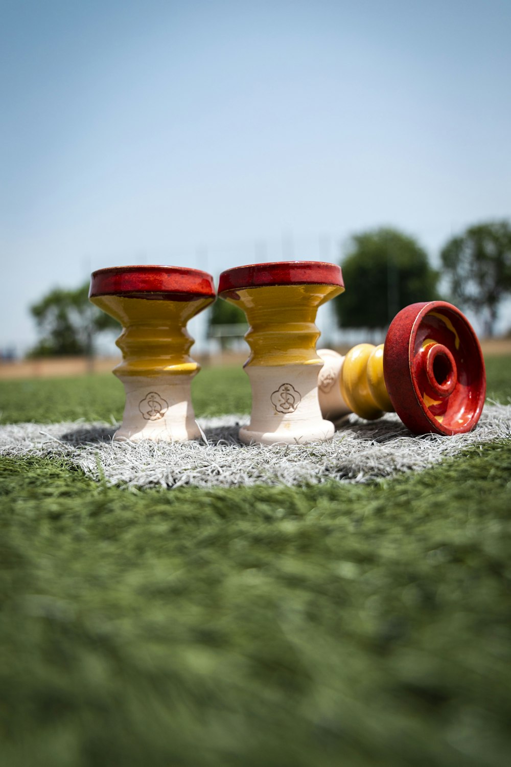 a group of gold and red candles