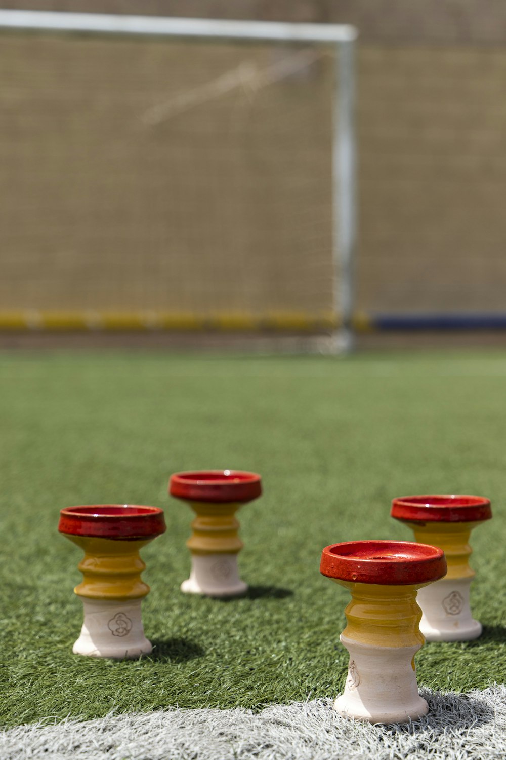 a group of small pots on grass