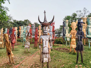 Close-up of colorful sculptures made from recycled metal and plastic pieces.