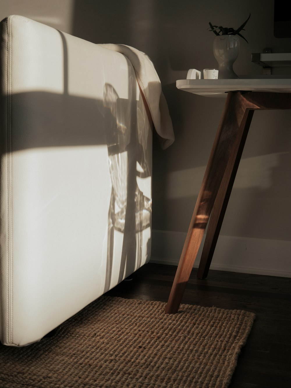 a white sheet over a wooden table