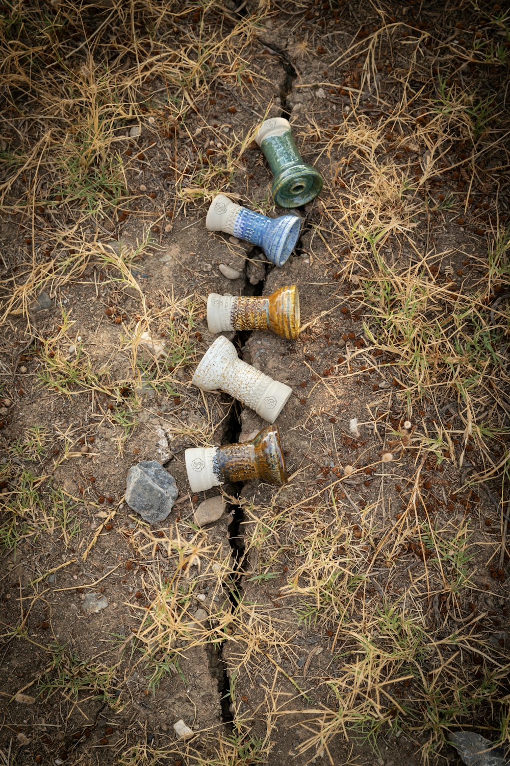 a group of bottles on the ground