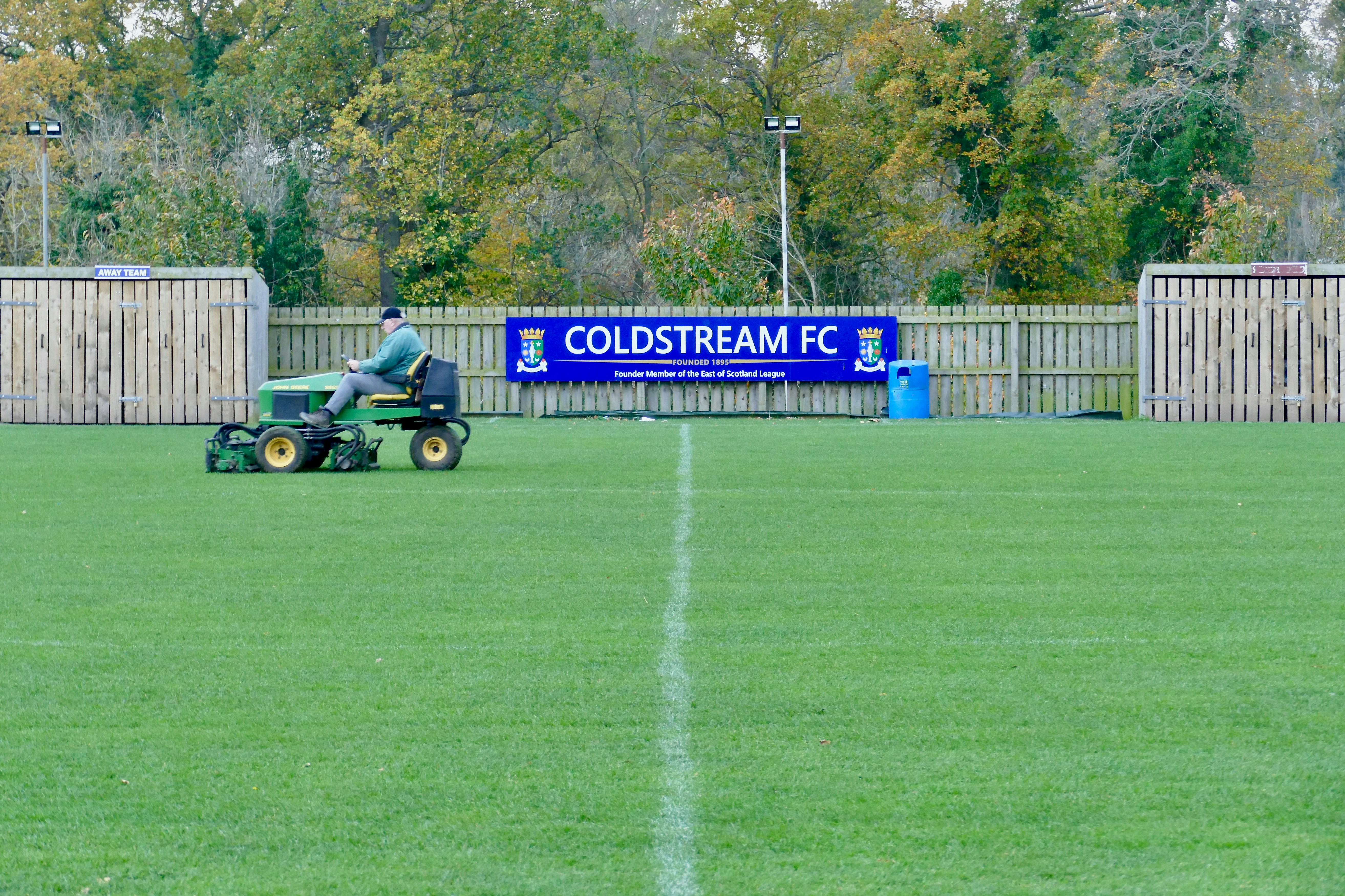 a person riding a lawn mower