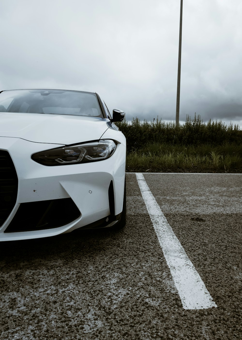 a white car parked on a road