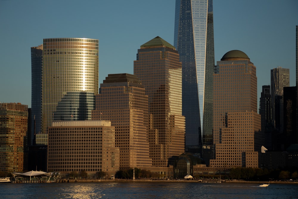 a city skyline with tall buildings