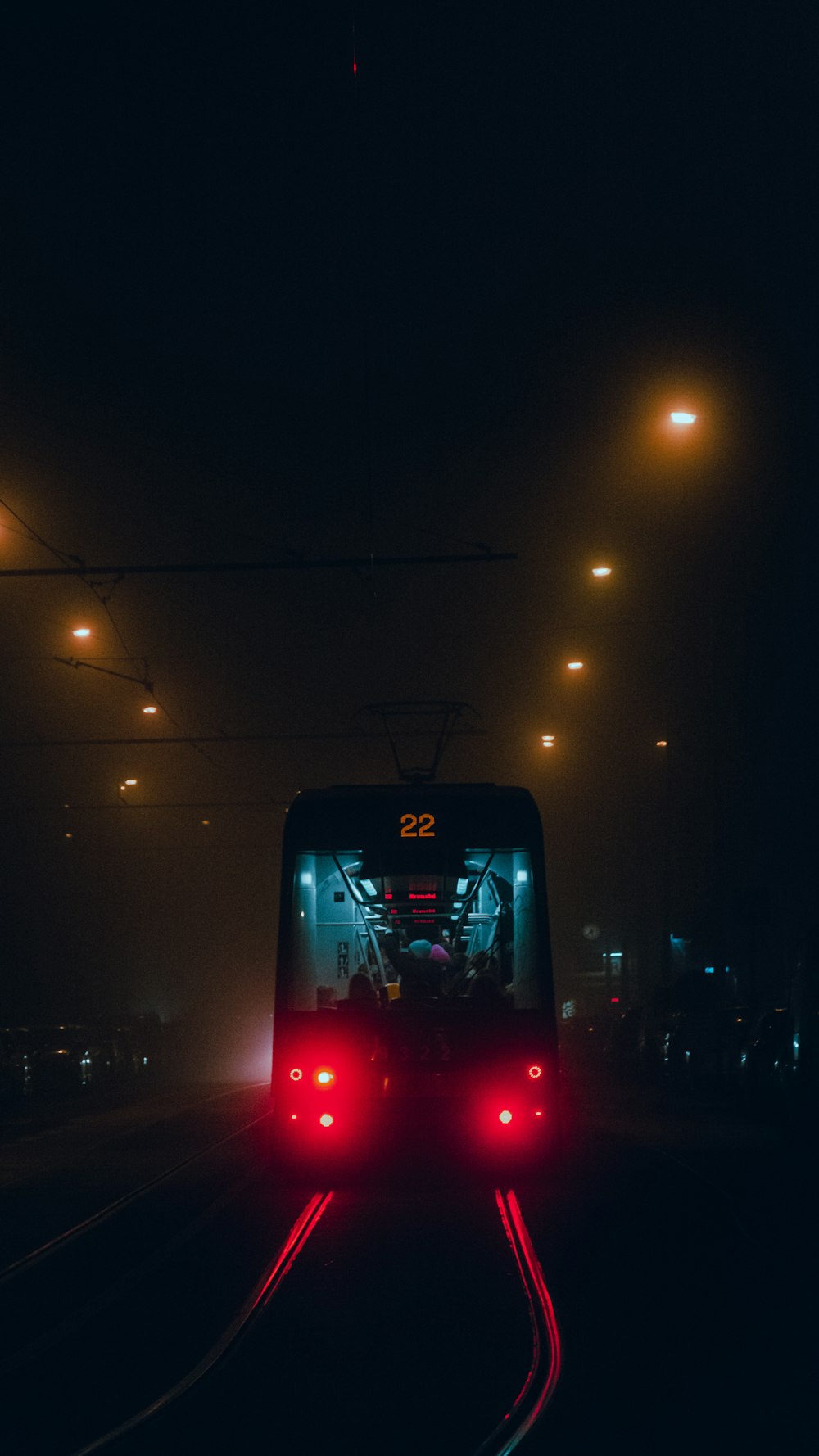 a train on the tracks at night