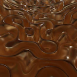 A sensual swirl of molten chocolate captured in motion with a warm caramel glow.