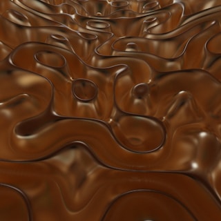 Close-up of a dark mocha epoxy floor with smooth, glossy finish and subtle 3D texture effects.
