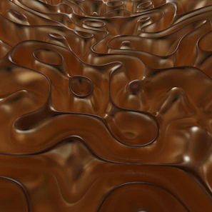 A sensual swirl of molten chocolate captured in motion with a warm caramel glow.