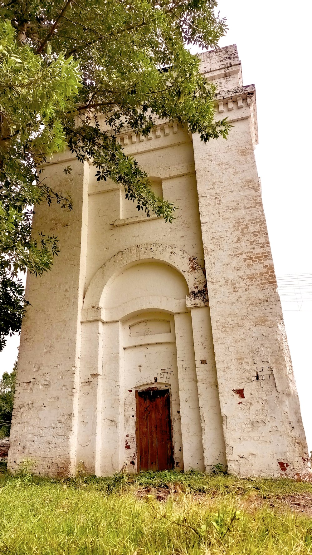 a stone building with a door