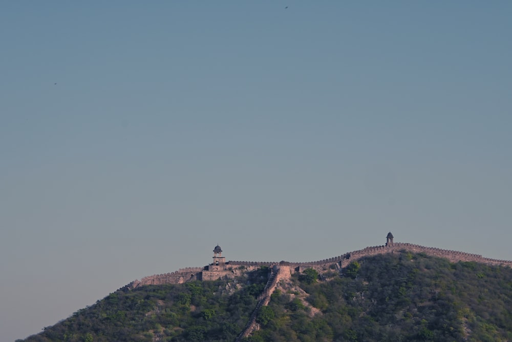 a large hill with a building on it