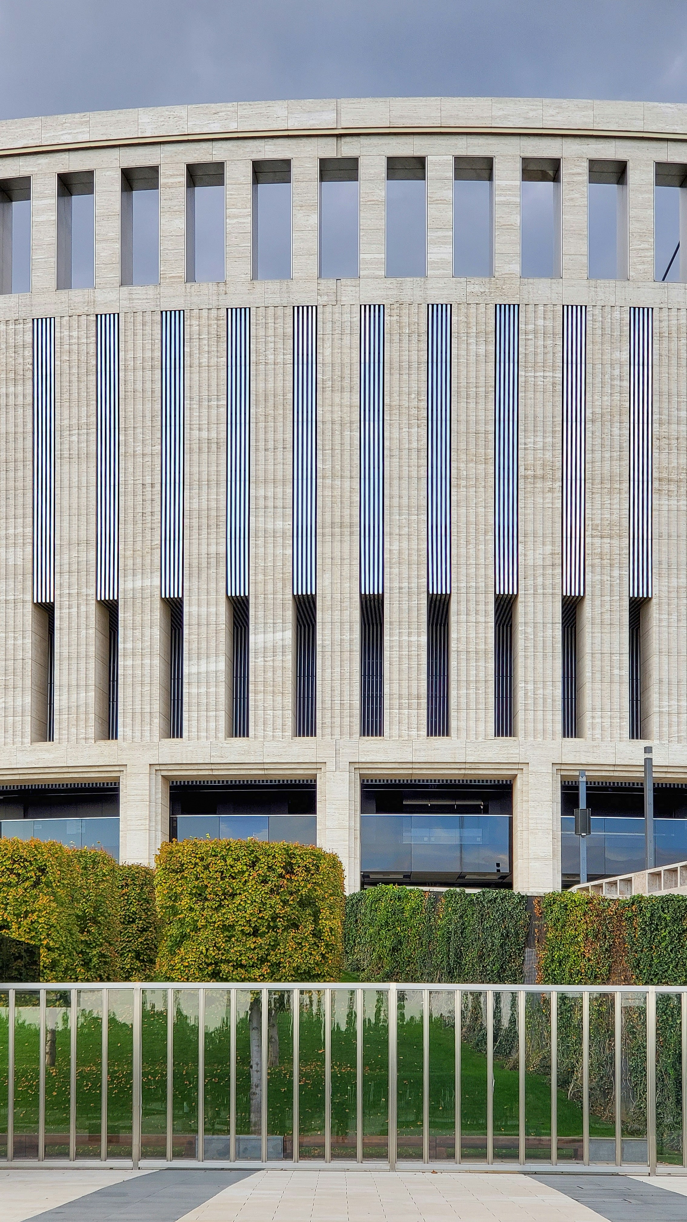 a building with a fence in front