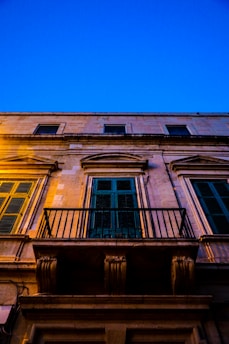 Restored stone facade shining after laser cleaning treatment in Bilbao.