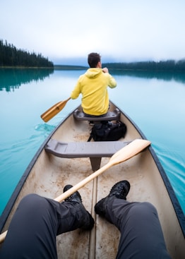 a person sitting in a boat