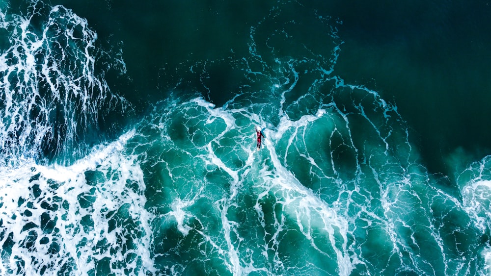 a person on a large wave
