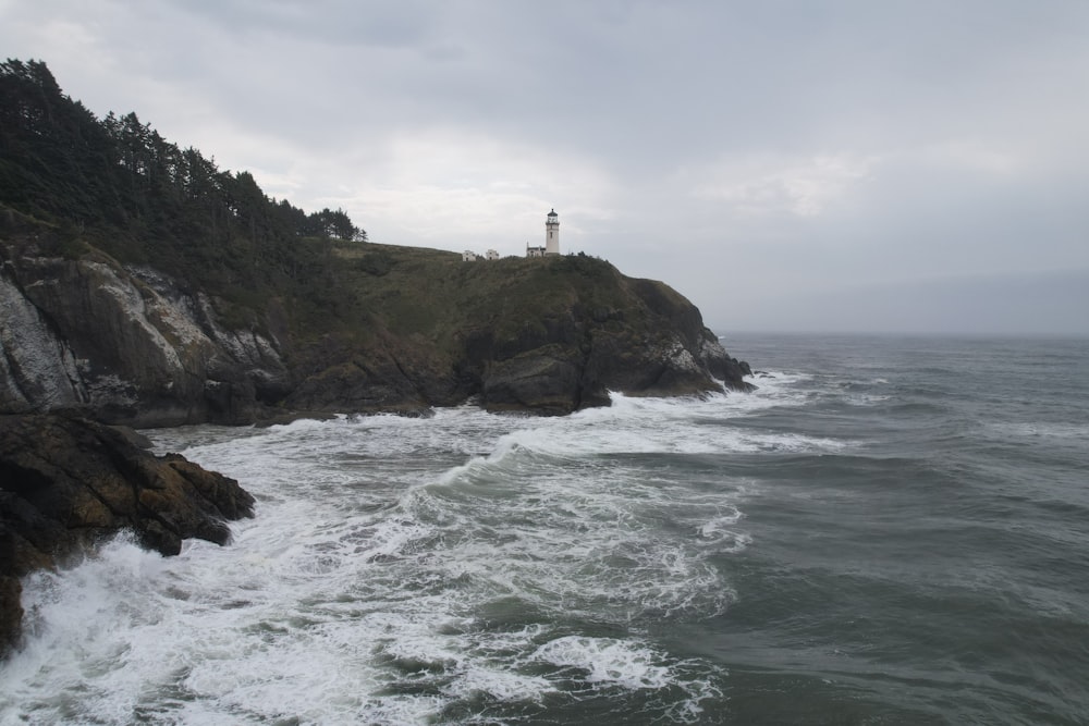 a lighthouse on a rocky coast